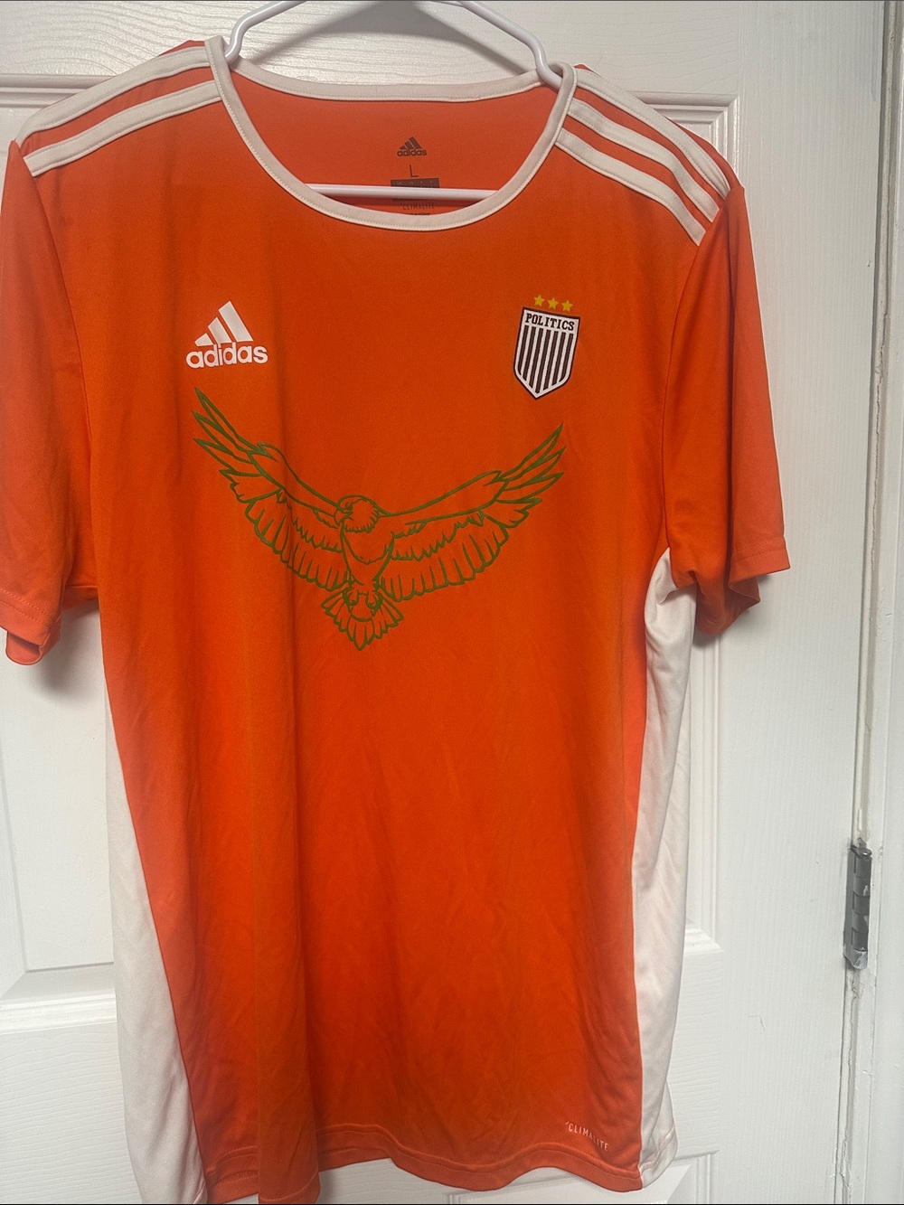adidas Men’s Orange Soccer Jersey with Eagle Graphic